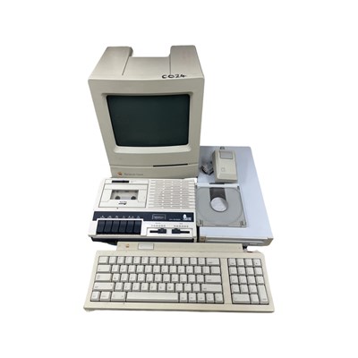 Lot 403 - An Apple Macintosh Classic M0420 computer,...