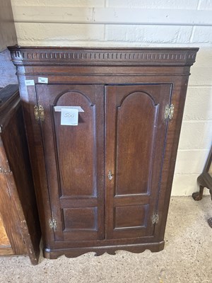 Lot 549 - Georgian oak wall mounted corner cabinet with...