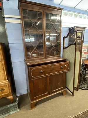 Lot 559 - A Georgian mahogany secretaire bookcase...