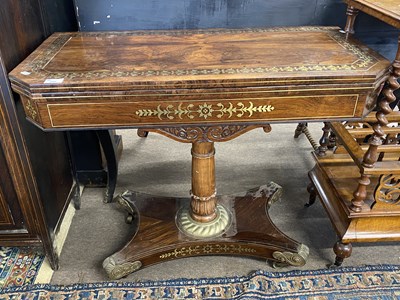 Lot 590 - Regency rosewood and brass inlaid card table,...