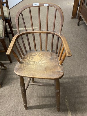 Lot 660 - 19th Century elm seated child's high chair,...