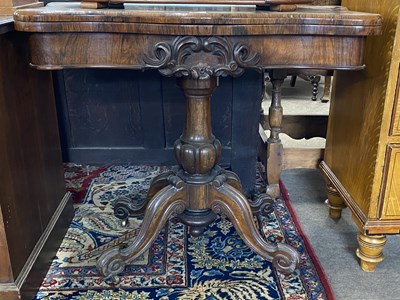 Lot 669 - Victorian rosewood pedestal card table with...