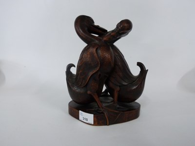 Lot 310 - Oriental pair of carved wooden ducks on shaped...