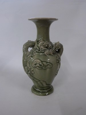 Lot 313 - Chinese vase with celadon glaze, decorated in...