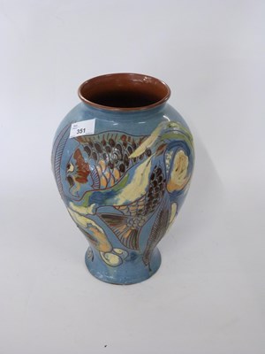 Lot 351 - An early 20th Century Barum pottery fish vase...