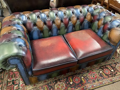 Lot 691 - Multi coloured leather Chesterfield two seater...