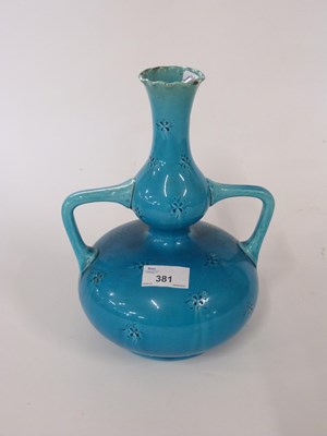 Lot 381 - Turquoise glazed vase with loop or angular...