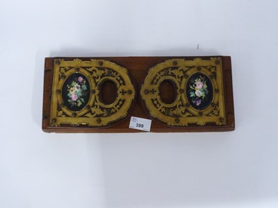 Lot 399 - Wooden book ends, each end with a inlaid panel...