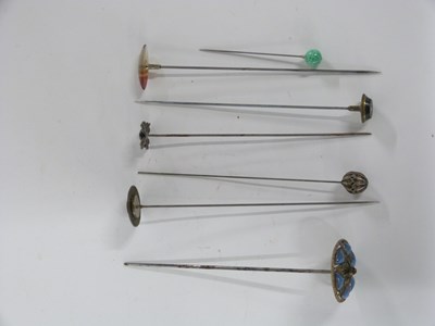 Lot 518 - Series of hat pins, some with enamelled...