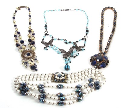 Lot 182 - A necklace by Yve Speight, the blue, cream and...