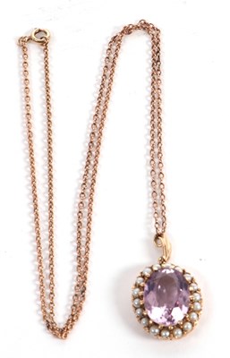 Lot 92 - An amethyst and cultured pearl pendant, the...