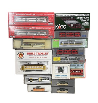 Lot 225 - A mixed lot of various boxed die-cast tram...