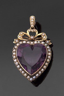 Lot 375 - An Edwardian amethyst and pearl pendant, the...