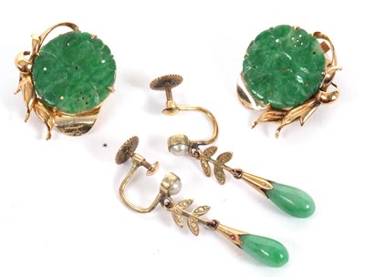 Lot 119 - Two pairs of jade earrings, the first set with...