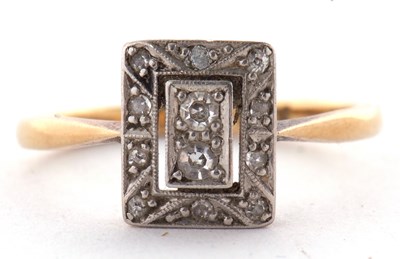 Lot 55 - An Edwardian 18ct diamond ring, the...