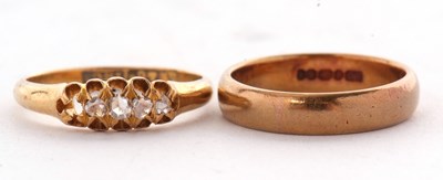 Lot 68 - Two gold rings, the first a 22ct wedding band...