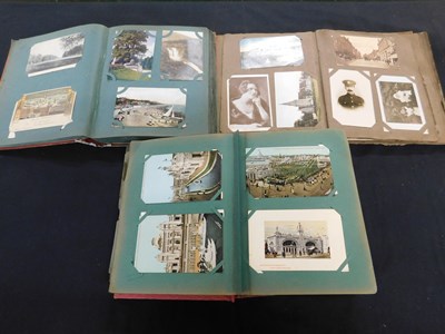 Lot 529 - Three old postcard albums containing large...