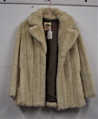 Lot 70 - A lady's cream fox fur jacket by Mallinby,...