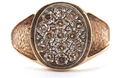 Lot 64 - A 9ct diamond ring, with a pave diamond set...