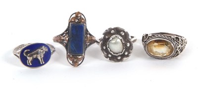 Lot 217 - Four rings: to include a white metal and...