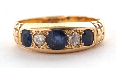 Lot 53 - An Edwardian 18ct sapphire and diamond ring,...