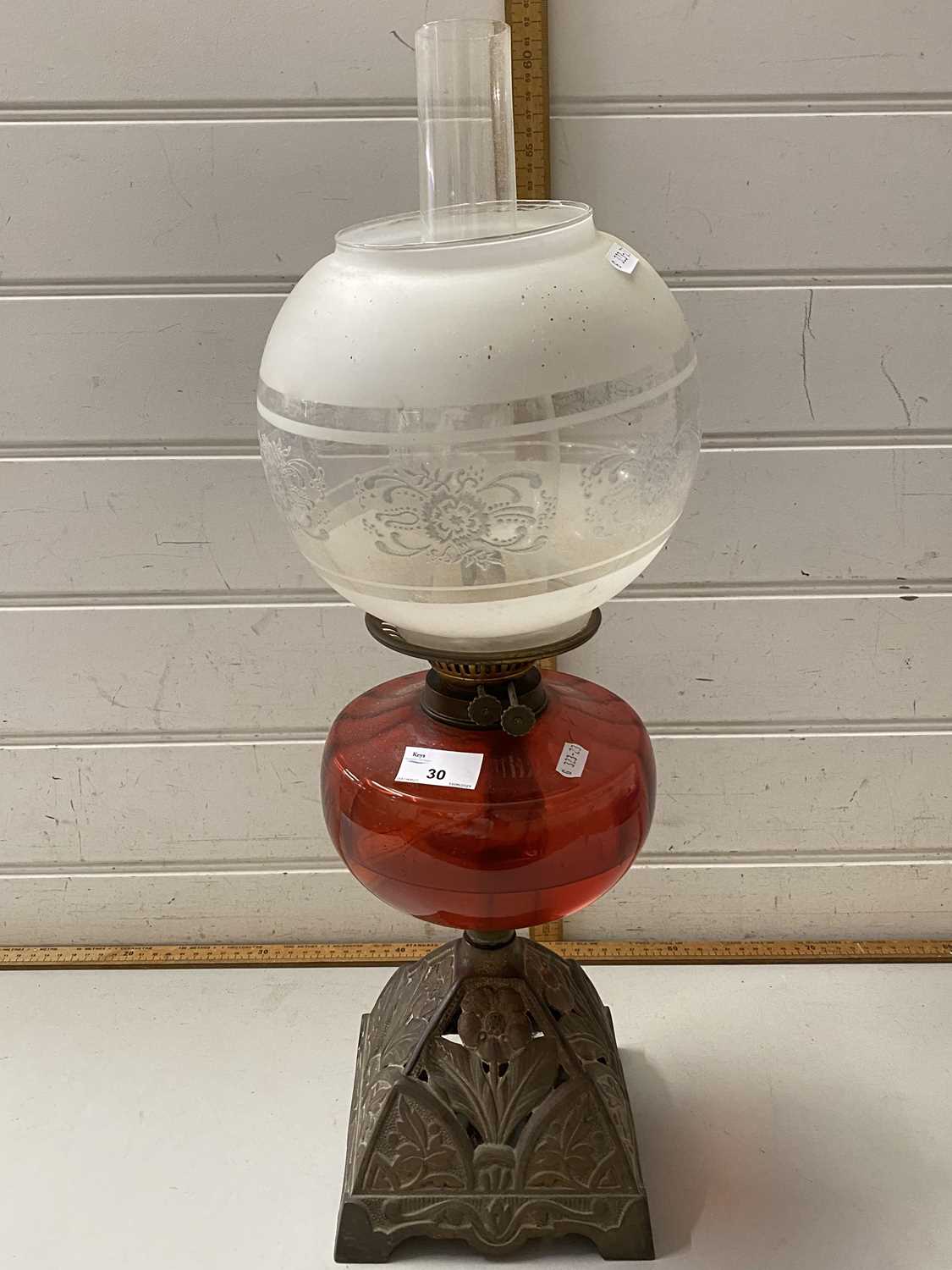 Lot 30 - Late 19th Century oil lamp with ruby glass font