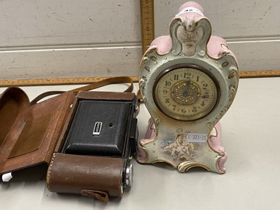 Lot 42 - Porcelain cased mantel clock and a Kodak camera