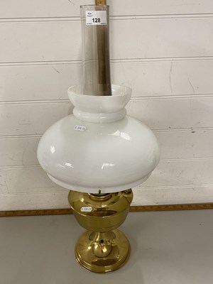 Lot 128 - Brass based oil lamp