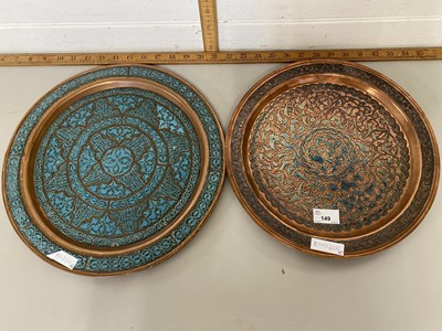 Lot 149 - Two Middle Eastern copper and enamel finish...