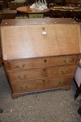 Lot 353 - George III oak bureau with full front opening...