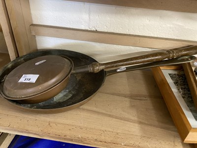 Lot 519 - Copper frying pan and a small copper warming pan