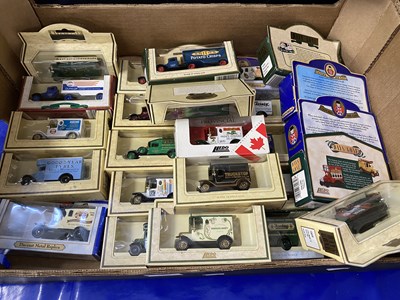 Lot 559 - Quantity of assorted toy trucks and vans to...