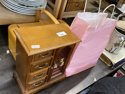 Lot 649 - Fold out wooden sewing box together with a...