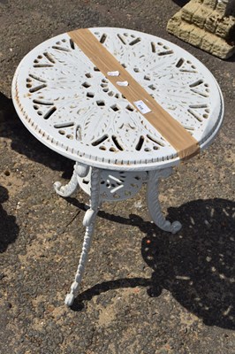 Lot 818 - Small painted cast iron garden table