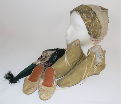 Lot 12 - A pair of lady's Victorian shoes, in green...