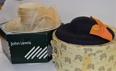 Lot 114 - A navy blue and orange silk hat by Joan Biggs,...