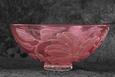 Lot 19 - A Studio Glass bowl of red colour decorated...