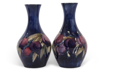 Lot 67 - A pair of early 20th Century Moorcroft vases...