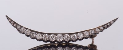 Lot 377 - A Victorian diamond crescent brooch, set with...