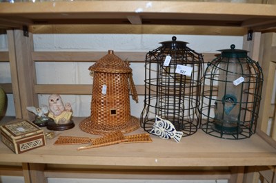 Lot 527 - Bird feeders, owl figures etc