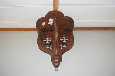 Lot 16 - A wall mounted wooden gothic style bracket...