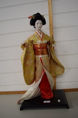 Lot 20 - Model of a Geisha, approx 58cm high including...