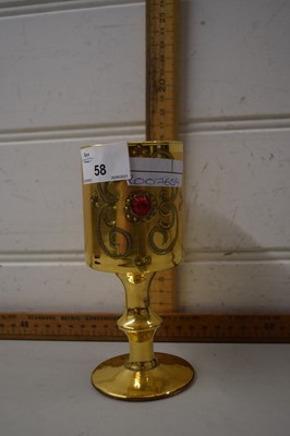 Lot 58 - A gilt glass goblet with red paste decoration