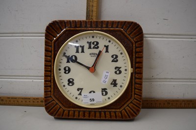 Lot 59 - Emes quartz  wall clock with ceramic frame