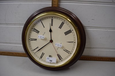 Lot 64 - A wooden and brass framed wall clock