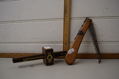 Lot 70 - A folding pocket wooden handled tree saw and a...