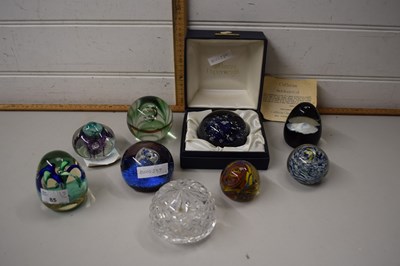 Lot 85 - Eight assorted glass paperweights to include...