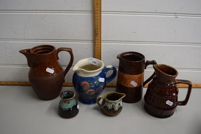 Lot 138 - Quantity of ceramic jugs in mainly brown glaze