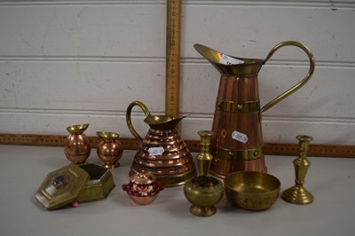 Lot 166 - Group of copper jugs and brass candlesticks