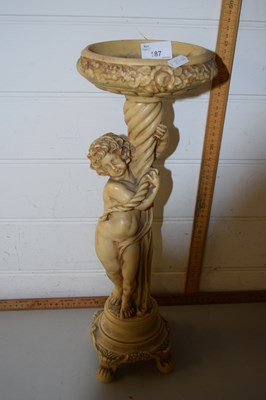 Lot 187 - Resin plant stand modelled as a classical...